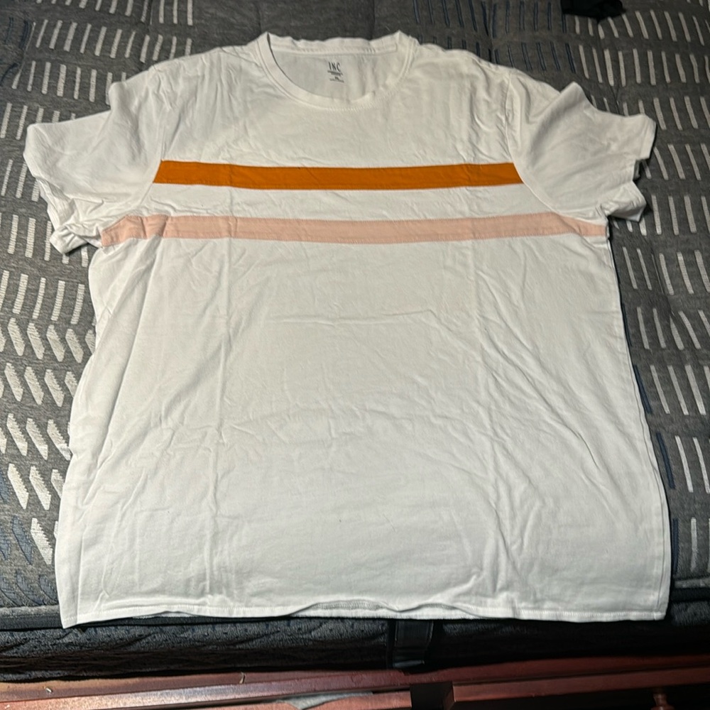 Millie Whitey has orange, striped and pink striped across the chest